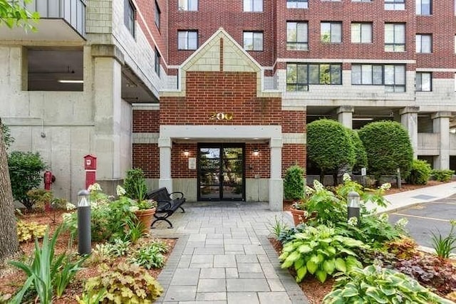 200 Ledgewood Dr Unit 604, Stoneham, MA 02180 - entrance to property featuring brick siding and french doors