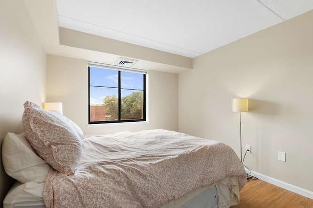 200 Ledgewood Dr Unit 604, Stoneham, MA 02180 - bedroom with wood finished floors and baseboards