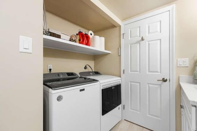 200 Ledgewood Dr Unit 604, Stoneham, MA 02180 - washroom with washing machine and clothes dryer and light wood finished floors