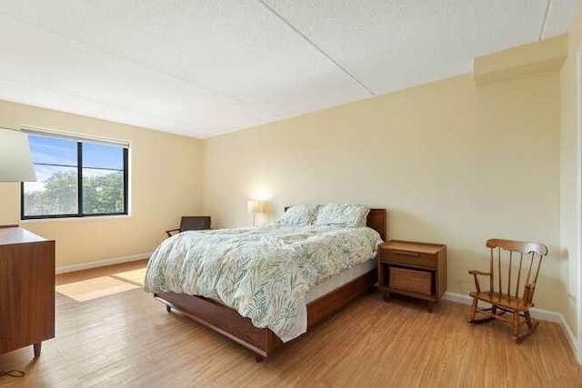200 Ledgewood Dr Unit 604, Stoneham, MA 02180 - bedroom with light wood finished floors and baseboards