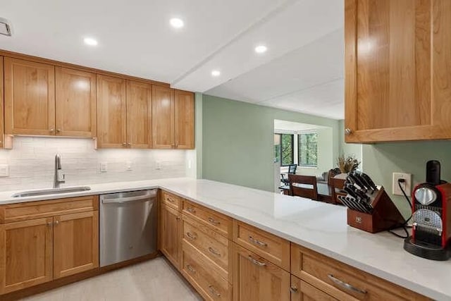 200 Ledgewood Dr Unit 604, Stoneham, MA 02180 - kitchen with stainless steel dishwasher, recessed lighting, decorative backsplash, and brown cabinetry