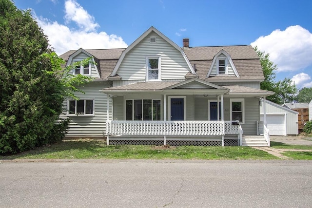 7 Dewey Ave, East Longmeadow, MA 01028 - colonial inspired home with a gambrel roof, a porch, roof with shingles, and a detached garage
