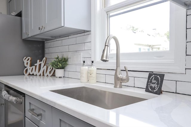 7 Dewey Ave, East Longmeadow, MA 01028 - kitchen with gray cabinetry, tasteful backsplash, and plenty of natural light