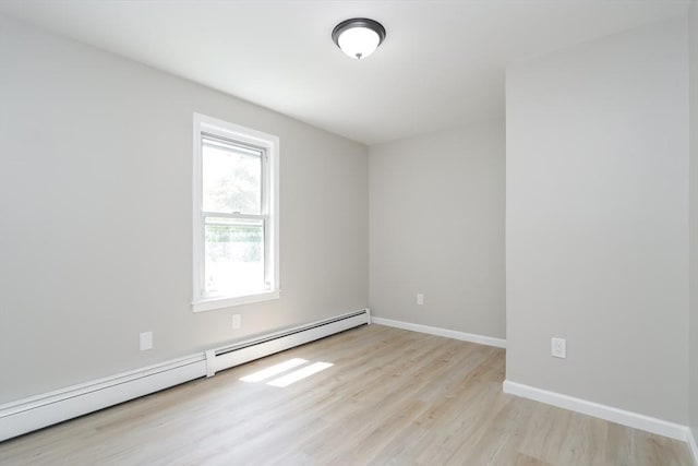 7 Dewey Ave, East Longmeadow, MA 01028 - empty room with baseboard heating and light wood-type flooring