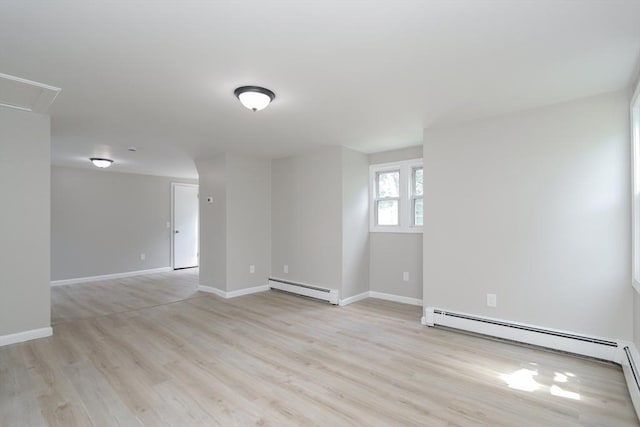 7 Dewey Ave, East Longmeadow, MA 01028 - spare room featuring a baseboard radiator and light wood-style floors
