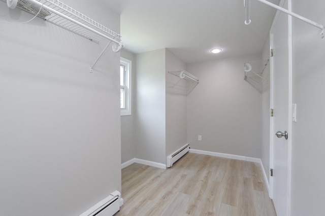 7 Dewey Ave, East Longmeadow, MA 01028 - spacious closet with baseboard heating and light wood finished floors
