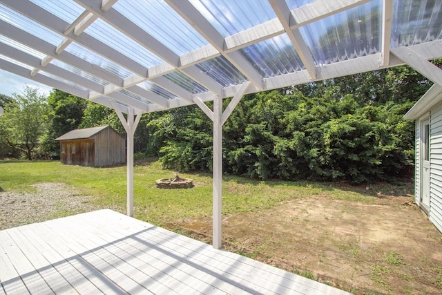 7 Dewey Ave, East Longmeadow, MA 01028 - wooden terrace with an outdoor fire pit, a shed, a pergola, and a yard