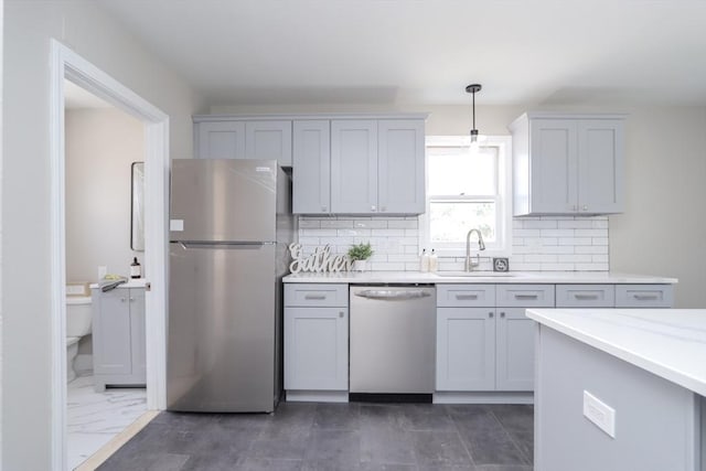 7 Dewey Ave, East Longmeadow, MA 01028 - kitchen featuring dishwasher, freestanding refrigerator, light countertops, and tasteful backsplash