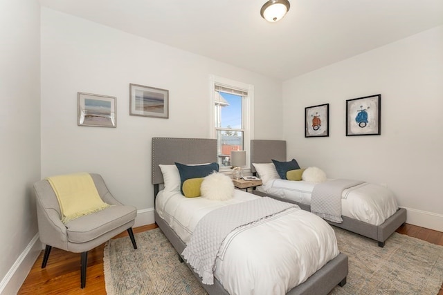 bedroom with wood-type flooring