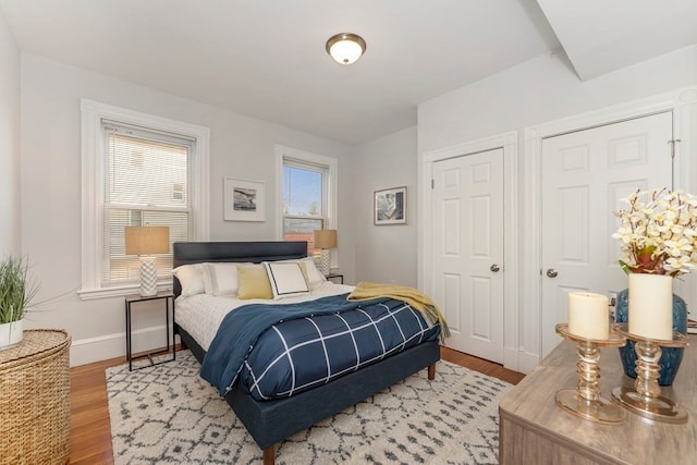 bedroom with light wood-type flooring