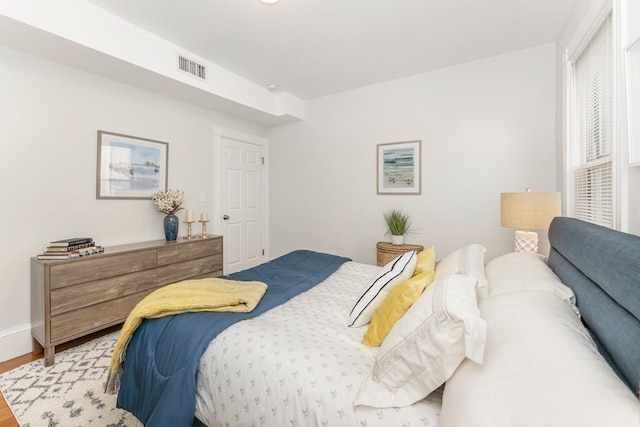 bedroom featuring light hardwood / wood-style flooring