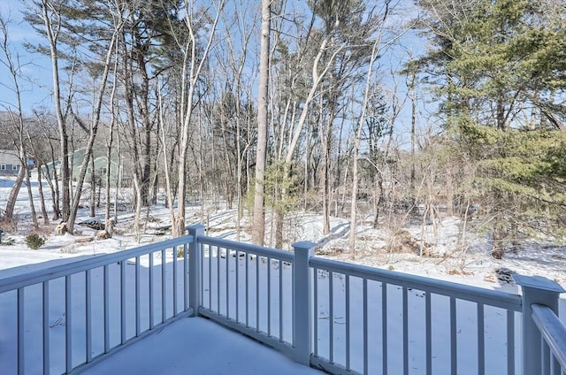 view of snow covered deck