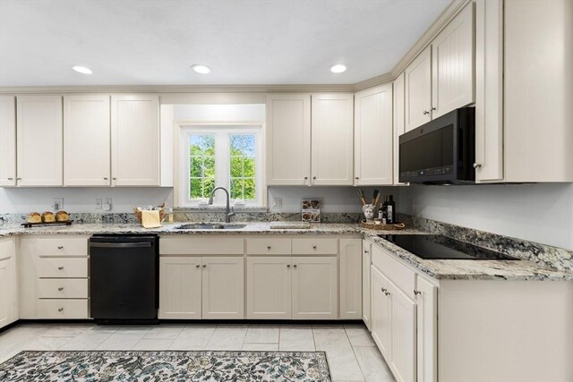 51 Lilah Ln, Reading, MA 01867 - kitchen featuring black appliances, a sink, light tile patterned flooring, light stone counters, and recessed lighting