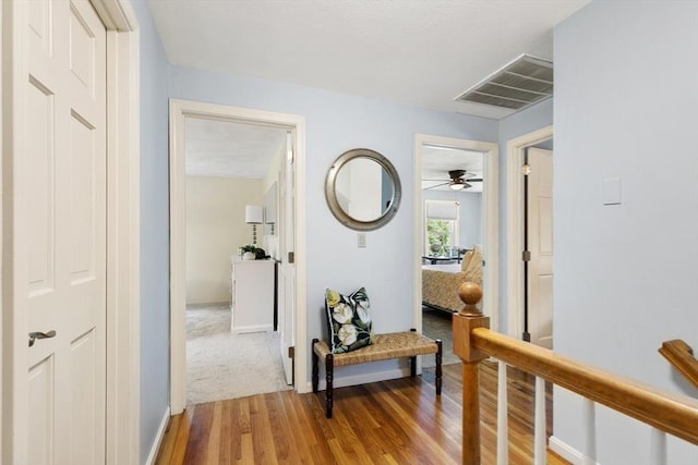 51 Lilah Ln, Reading, MA 01867 - corridor featuring wood finished floors and baseboards