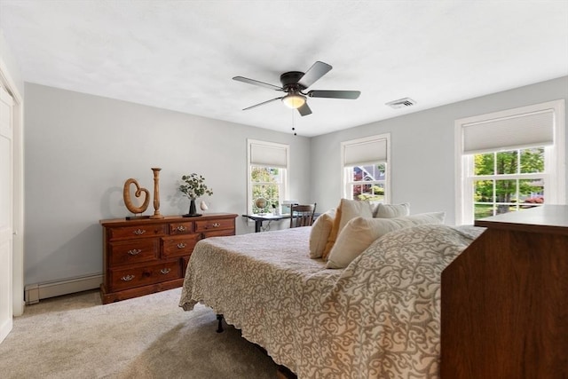 51 Lilah Ln, Reading, MA 01867 - carpeted bedroom featuring a baseboard radiator and a ceiling fan