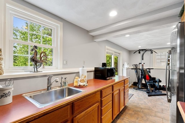 51 Lilah Ln, Reading, MA 01867 - kitchen featuring a sink, black microwave, brown cabinetry, recessed lighting, and beamed ceiling