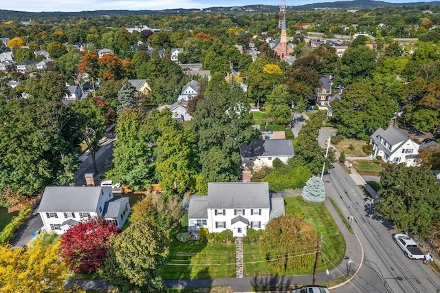 birds eye view of property with a residential view