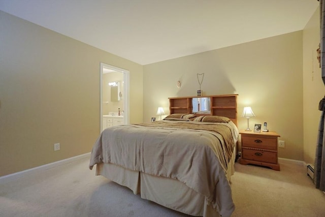4 Colonial Rd, Webster, MA 01570 - bedroom with light carpet, ensuite bathroom, and a baseboard heating unit