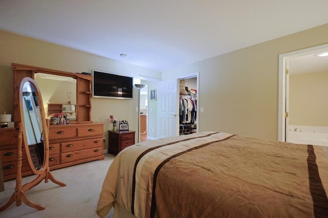 4 Colonial Rd, Webster, MA 01570 - bedroom with light carpet, ensuite bath, and a walk in closet