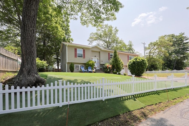 4 Colonial Rd, Webster, MA 01570 - raised ranch featuring a fenced front yard