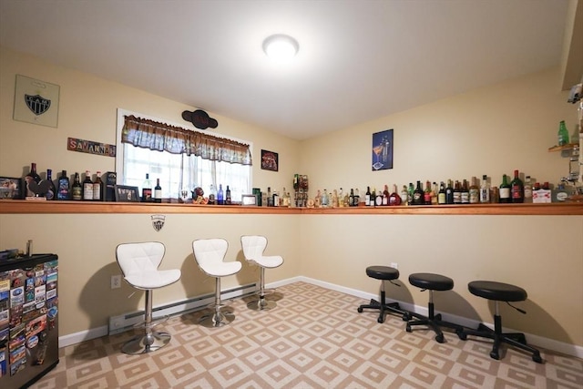 4 Colonial Rd, Webster, MA 01570 - indoor dry bar featuring tile patterned floors and a baseboard radiator