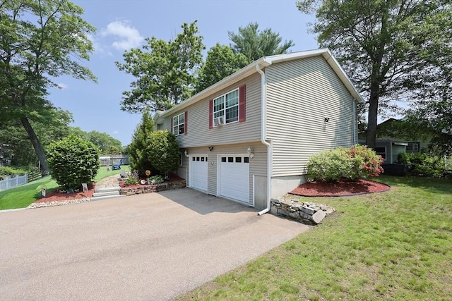 4 Colonial Rd, Webster, MA 01570 - view of side of home featuring driveway and a garage