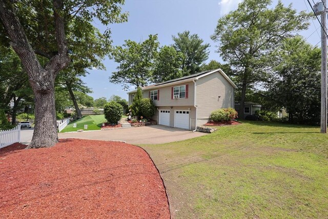 4 Colonial Rd, Webster, MA 01570 - view of front of property featuring a garage and driveway