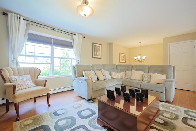 4 Colonial Rd, Webster, MA 01570 - living room with a chandelier and wood finished floors