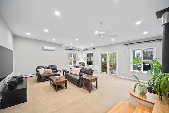 living area featuring a baseboard radiator, recessed lighting, light carpet, a wall mounted AC, and plenty of natural light