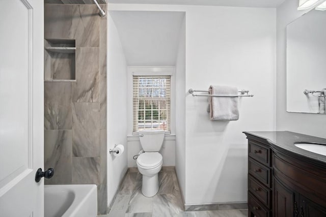 bathroom featuring toilet, bathtub / shower combination, baseboards, and vanity