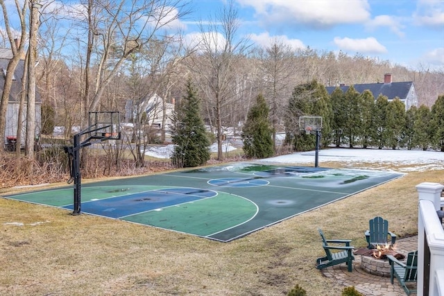 view of sport court with community basketball court and a lawn