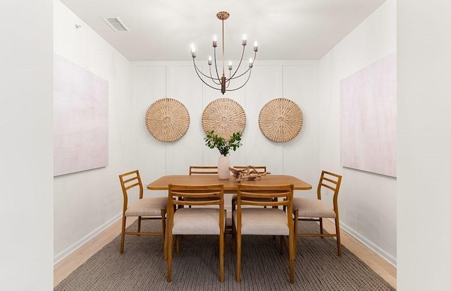2 Codman Way Unit 311, Westborough, MA 01581 - dining space with a chandelier, light wood-type flooring, and baseboards