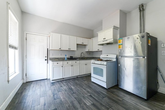 107 Devon St, Boston, MA 02121 - kitchen with freestanding refrigerator, gas range gas stove, under cabinet range hood, and healthy amount of natural light