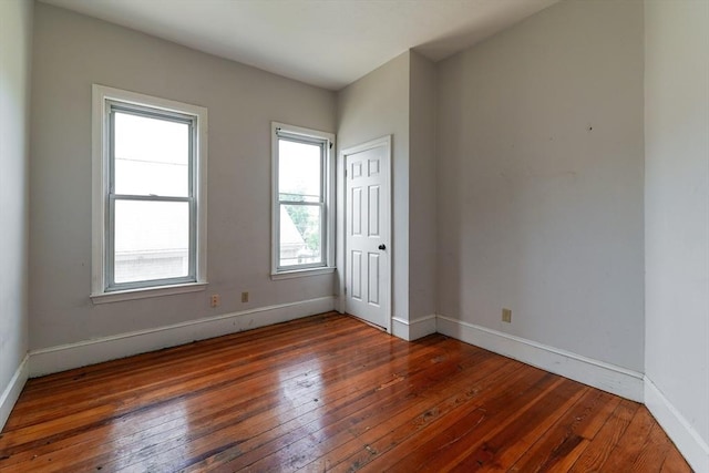 107 Devon St, Boston, MA 02121 - unfurnished bedroom with hardwood / wood-style floors and baseboards