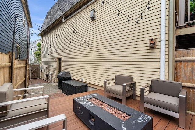 37-1/2 Federal St, Newburyport, MA 01950 - wooden terrace with grilling area, a gate, and an outdoor living space with a fire pit