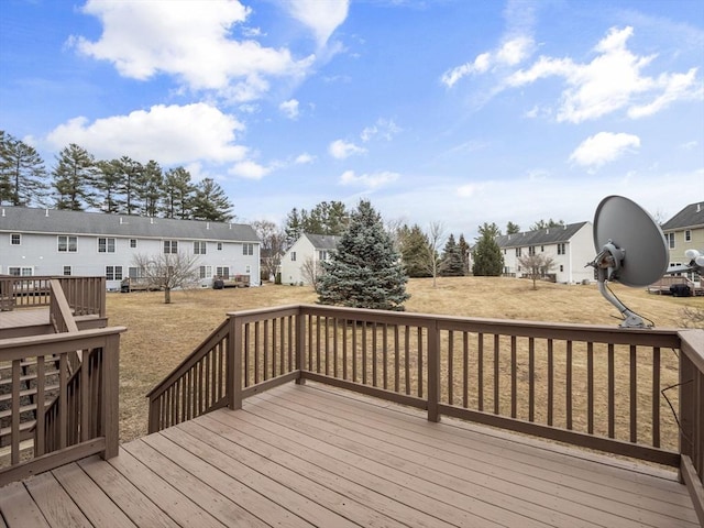 wooden deck featuring a residential view