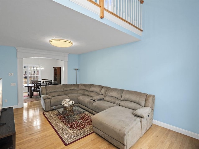 living room with light wood-style floors and baseboards