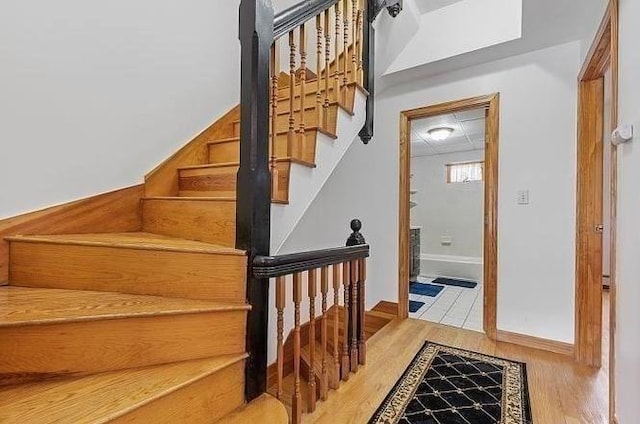 21 Parker St, Boston, MA 02129 - staircase with wood finished floors and baseboards