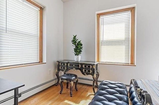 21 Parker St, Boston, MA 02129 - office area with baseboard heating, plenty of natural light, and wood finished floors