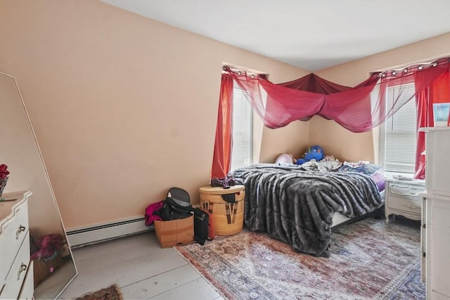 bedroom with a baseboard radiator