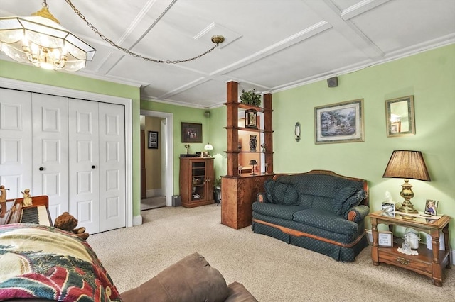 carpeted living room featuring baseboards and a notable chandelier
