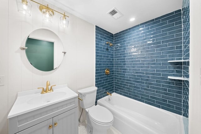 full bathroom with visible vents, toilet, shower / washtub combination, and vanity