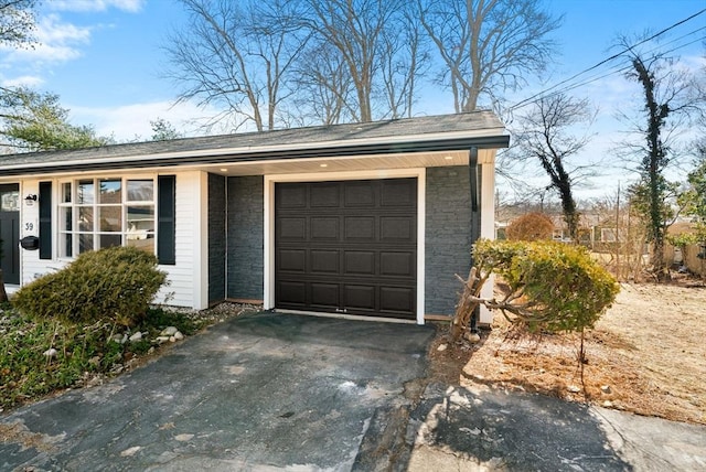 garage with driveway