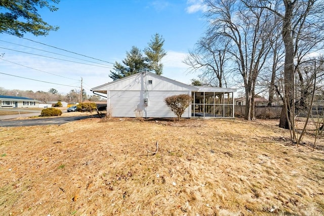 exterior space with a sunroom