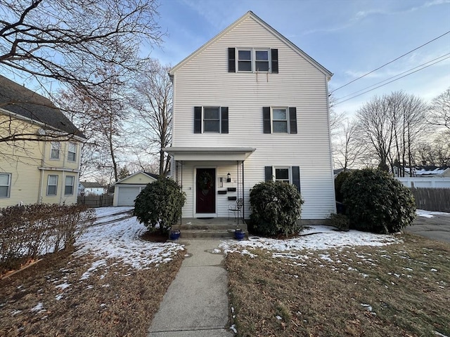 front of property with an outbuilding and a garage