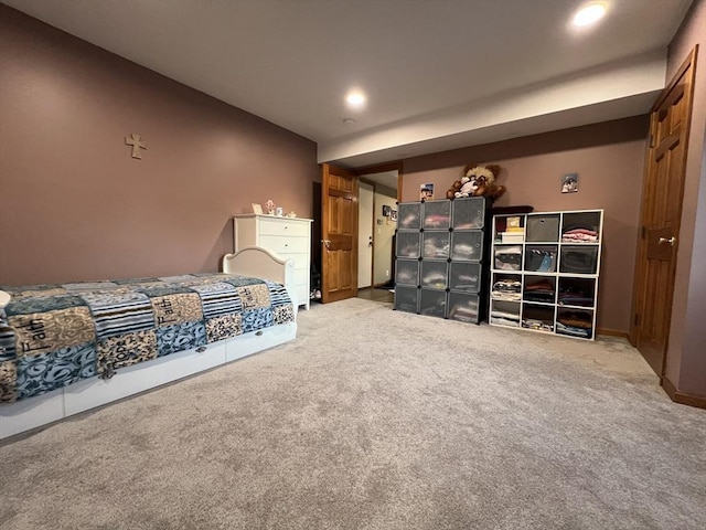 unfurnished bedroom featuring light colored carpet