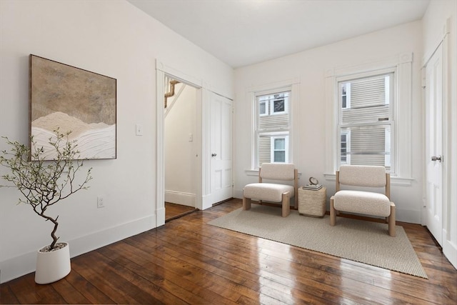 living area featuring dark hardwood / wood-style flooring