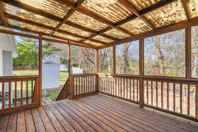 unfurnished sunroom with a healthy amount of sunlight