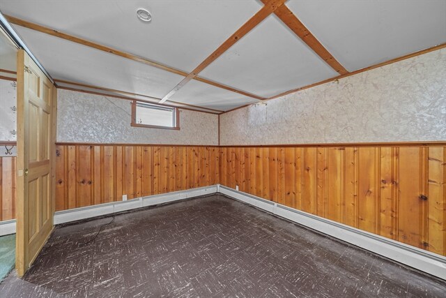 interior space featuring wooden walls