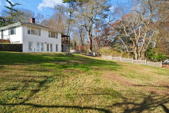 view of yard featuring a wooden deck